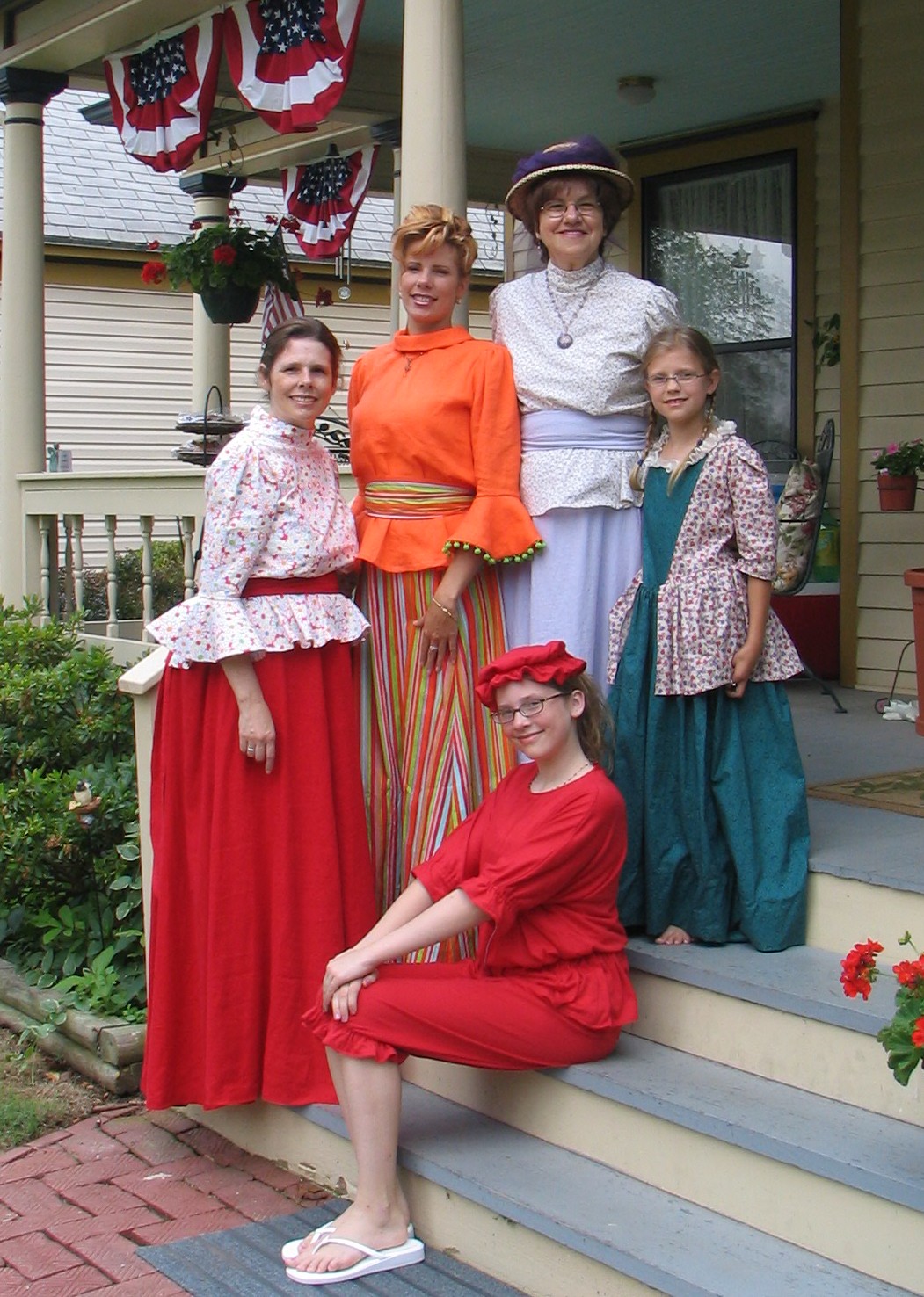 Me (far left) and (clockwise) my sister Amy, my mother Sandy, and my older daughters 
  Tatyanna and Kyrstie (sitting) in early Twentieth Century costume