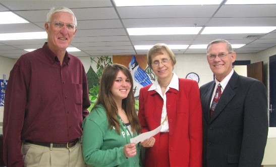 Brittney Brown with Principal Carl Clark (left) and Harriet Morgan and Larry Foreman of the Society